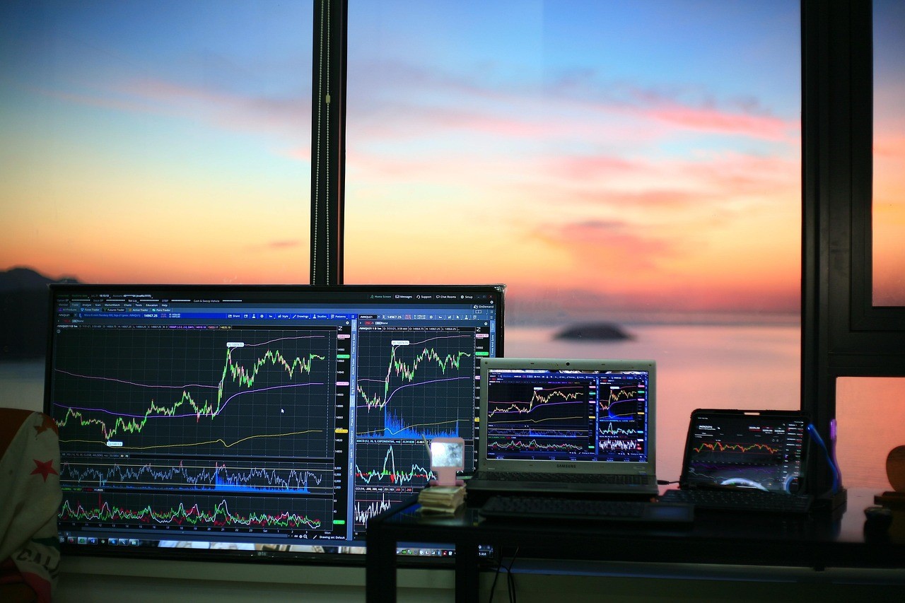 Diversified investment portfolio showing stocks, real estate, and other assets representing executive wealth